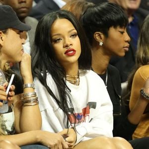 Rihanna assiste à un match caritatif de basketball à New York auquel Chris Brown participe, le 21 août 2014. FAMEFLYNET / BESTIMAGE