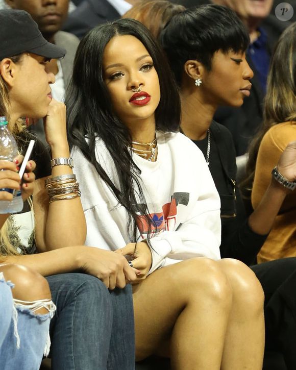 Rihanna assiste à un match caritatif de basketball à New York auquel Chris Brown participe, le 21 août 2014. FAMEFLYNET / BESTIMAGE