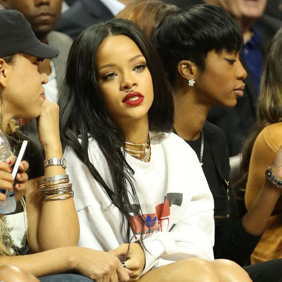 Rihanna assiste à un match caritatif de basketball à New York auquel Chris Brown participe, le 21 août 2014. FAMEFLYNET / BESTIMAGE