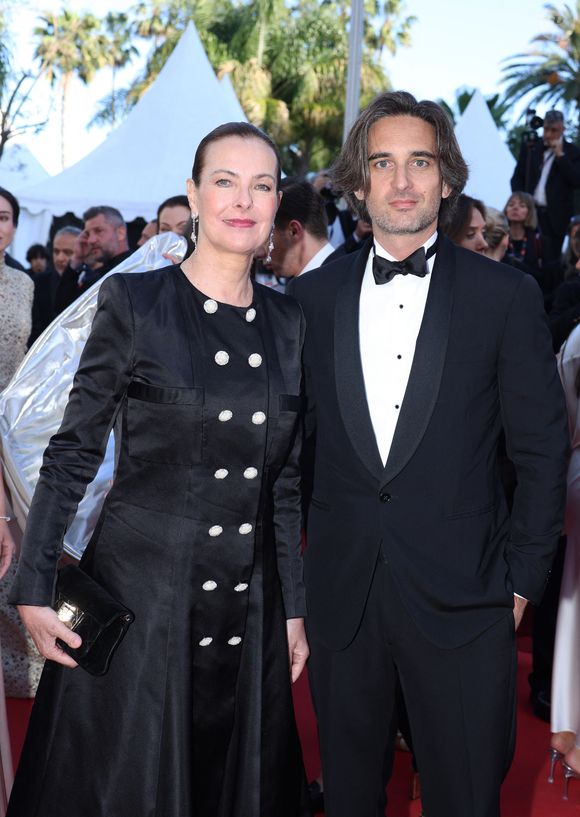 Carole Bouquet et son fils Dimitri Rassam - Montée des marches du film « Megalopolis » lors du 77ème Festival International du Film de Cannes, au Palais des Festivals à Cannes. Le 16 mai 2024 
©Agence / Bestimage