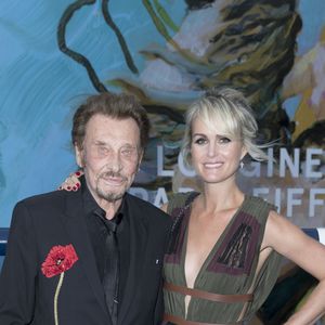 Exclusif - Johnny Hallyday et sa femme Laeticia Hallyday - Soirée au profit de l'Association "La Bonne étoile" de Laeticia Hallyday lors du 3ème Longines Paris Eiffel Jumping à la plaine de Jeux de Bagatelle à Paris le 1er juillet 2016 dans le Pavillon Eiffel du Longines Paris Eiffel Jumping décoré par Luxury Living. © Olivier Borde / Veeren / Bestimage