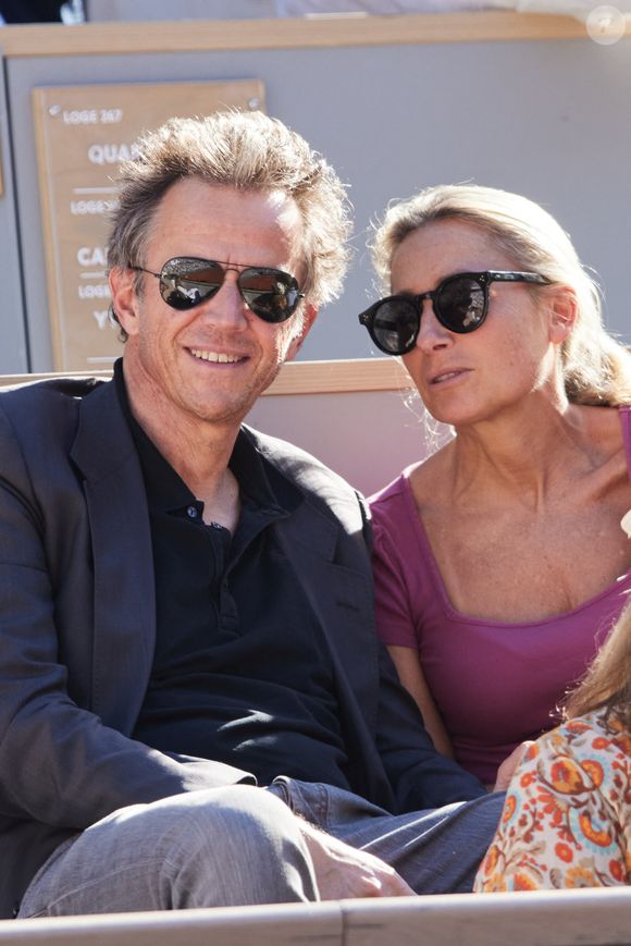 Anne-Sophie Lapix et son mari Arthur Sadoun - Célébrités dans les tribunes des Internationaux de France de tennis de Roland Garros 2024 à Paris le 7 juin 2024.  © Jacovides-Moreau/Bestimage