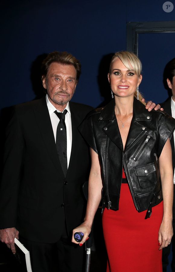 Johnny Hallyday et sa femme Laeticia - Avant-première de 'Salaud on t'aime' à l'UGC Normandie sur les Champs-Elysées à Paris le 31 mars 2014.  
© DOMINIQUE JACOVIDES / BESTIMAGE
