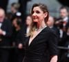 Tous deux posent sur une plage, révélant leur passion commune pour le surf.

Clotilde Courau sur le tapis rouge de la projection Alpha lors du 78ème Festival de Cannes au Palais des Festivals le 19 mai 2025 à Cannes, France. Photo par Jerome Domine/ABACAPRESS.COM