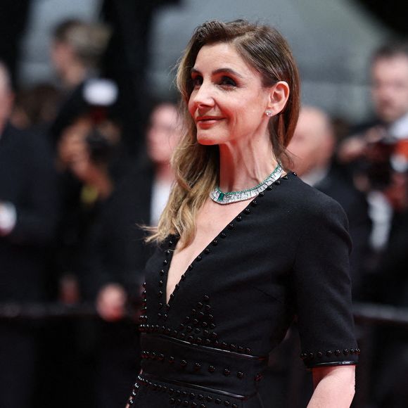 Tous deux posent sur une plage, révélant leur passion commune pour le surf.

Clotilde Courau sur le tapis rouge de la projection Alpha lors du 78ème Festival de Cannes au Palais des Festivals le 19 mai 2025 à Cannes, France. Photo par Jerome Domine/ABACAPRESS.COM