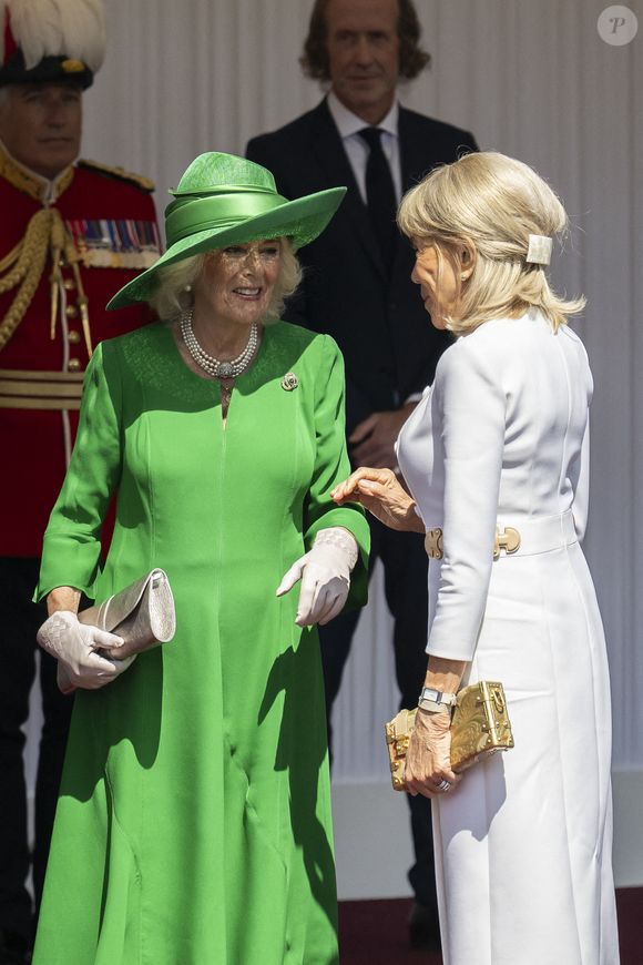 La reine Camilla, le roi Charles III, le président Emmanuel Macron et son épouse Brigitte Macron lors d'une cérémonie d'accueil à Datchet Road à Windsor, à l'ouest de Londres, au Royaume-Uni, le 8 juillet 2025, avant une visite d'État de trois jours du président français et de son épouse. Photo par Eliot Blondet/ABACAPRESS.COM