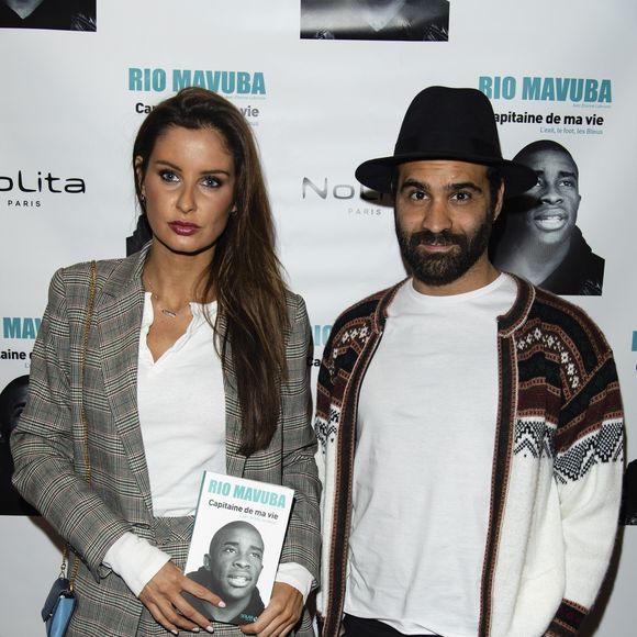 Exclusif - Malika Ménard (Miss France 2010) et son compagnon Ycare - Soirée de lancement du livre de Rio Mavuba "Capitaine de ma vie. L’exil, le foot, les Bleus" au restaurant NoLita Ristorante e Enoteca à Paris, France, le 14 novembre 2018. © Pierre Perusseau/Bestimage