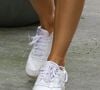 Une chaussure de sport mythique des années 1980 a été réinventée avec un cuir patiné ultra-luxe : la Reebok Freestyle.

Emily Ratajkowski à New-York, portant une paire blanche de chez Reebok.

©Bestimage