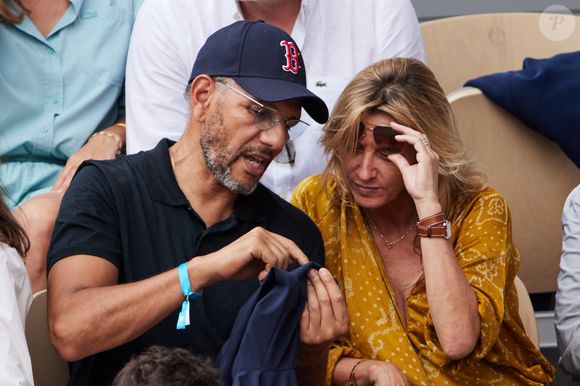 Roschdy Zem et sa compagne Sarah Lavoine - Célébrités en tribunes des Internationaux de France de tennis de Roland Garros 2023 à Paris le 11 juin 2023. © Jacovides-Moreau/Bestimage