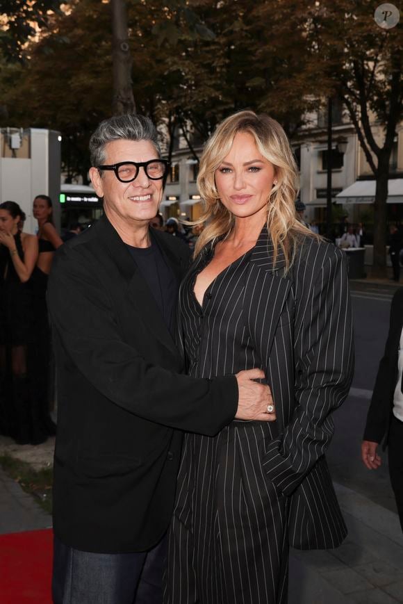 Marc Lavoine et sa compagne Adriana Karembeu arrivant au "Concerto pour la Paix" organisé par Omar Harfouch au Théâtre des Champs Élysées à Paris, France, le 18 Septembre 2024.
© Perusseau / Tribeca / Bestimage