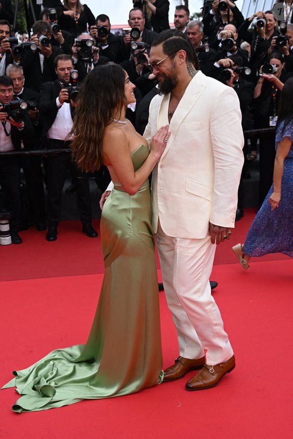 Adria Arjona, Jason Momoa assistant à la projection de "Highest 2 Lowest" au 78ème Festival de Cannes à Cannes, France, le 19 mai 2025. Photo : Doug Peters/PA Wire.