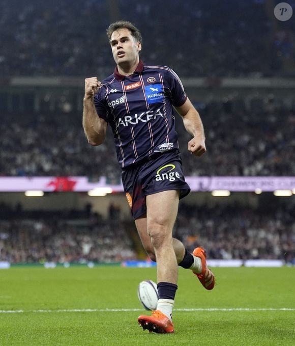 Le joueur de l'Union Bordeaux-Begles, Damian Penaud, célèbre le premier essai de son équipe lors de la finale de l'Investec Champions Cup au Principality Stadium de Cardiff. Date de la photo : samedi 24 mai 2025. Andrew Matthews/PA Wire.