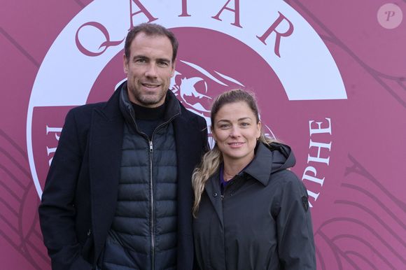 Laure Boulleau et son compagnon Bruno Cheyrou au prix Qatar Arc de Triomphe à l'Hippodrome de Longchamp le 6 octobre 2024  

© Rachid Bellak / Bestimage