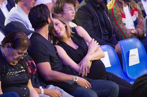 Maxim Nucci et sa petite amie enceinte Isabelle Ithurburu lors du combat de boxe international poids lourds entre Tony Yoka de France et Dave Allen du Royaume-Uni au Dôme Palais des sports le 23 juin 2018 à Paris, France. Photo by Nasser Berzane/ABACAPRESS.COM