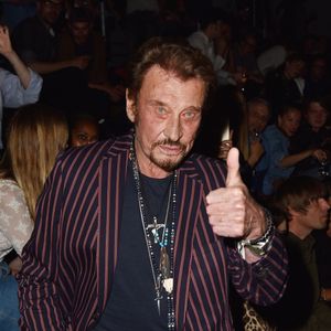Photo d'archive : le chanteur Johnny Hallyday assiste au défilé Saint Laurent Homme printemps-été 2016 dans le cadre de la Fashion Week de Paris, le 28 juin 2015 à Paris, en France. Photo de Laurent Zabulon/ABACAPRESS.COM