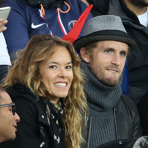 L'acteur Philippe Lacheau qui sera à l'affiche du film "Babysitting 2" et sa compagne Elodie Fontan (Qu'est ce qu'on a fait au bon dieu - Babysitting 2) en amoureux devant le match Psg - Guingamp au Parc des princes à Paris le 22 septembre 2015.  
©CYRIL MOREAU / BESTIMAGE