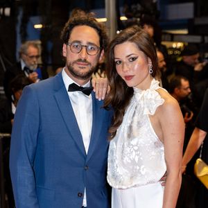Thomas Hollande, sa femme Emilie Broussouloux - Montée des marches du film "R.M.N." lors du 75ème Festival International du Film de Cannes, le 21 mai 2022.
© Cyril Moreau / Bestimage