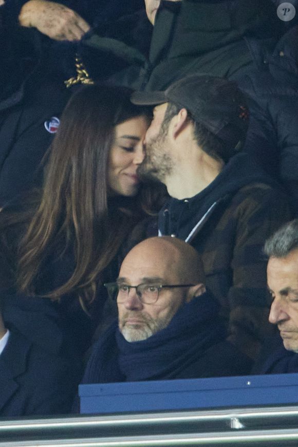 Exclusif - Louis Sarkozy et sa femme Natali Husic   - People en tribunes du match de Ligue 1 Uber Eats "PSG contre Reims" (1-1) au Parc des Princes à Paris le 29 janvier 2023. (AGENCE / BESTIMAGE).