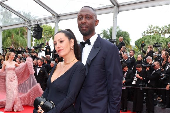 Karole Rocher et son mari Thomas Ngijol - Montée des marches du film « Highest 2 Lowest » lors du 78ème Festival International du Film de Cannes, au Palais des Festivals à Cannes. Le 19 mai 2025
© Jacovides-Moreau / Bestimage