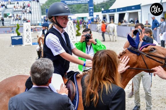 Nicolas Sarkozy, sa femme Carla Bruni et leur fille Giulia Sarkozy après le prix Kids Cup L’Envol dans l'Espace VIP lors de la 10ème édition du "Longines Paris Eiffel Jumping" à la Plaine de Jeux de Bagatelle à Paris, France, le 21 juin 2024. © Perusseau-Veeren/Bestimage