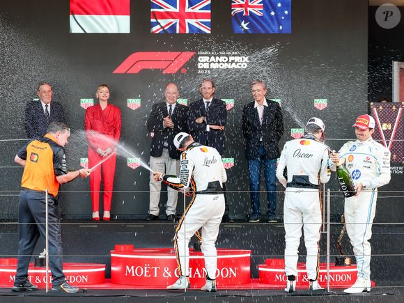 Zak Brown, Charles Leclerc, Lando Norris, Oscar Piastri, Michel Boeri, la princesse Charlene de Monaco, le prince Albert II de Monaco, Pierre Casiraghi et Bernard Arnault lors du Grand Prix de Formule 1 (F1) de Monaco, le 25 mai 2025. © Claudia Albuquerque/Bestimage