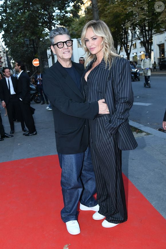 Marc Lavoine et sa compagne Adriana Karembeu arrivant au "Concerto pour la Paix" organisé par Omar Harfouch au Théâtre des Champs Élysées à Paris, France, le 18 Septembre 2024.  © Rachid Bellak / Bestimage