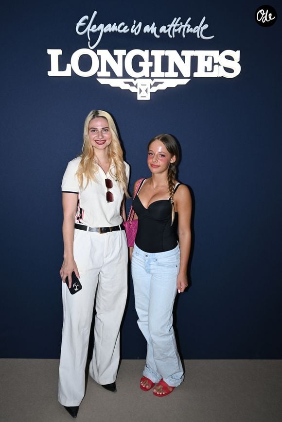 Nina Kopaeva et Guilia Sarkozy dans l'espace VIP, le Pavillon Eiffel, lors de la 12ème édition Longines Paris Eiffel Jumping au pied de la Tour Eiffel sur le Champ-de-Mars à Paris, France, le 19 juin 2026. 

© Perusseau-Veeren/Bestimage