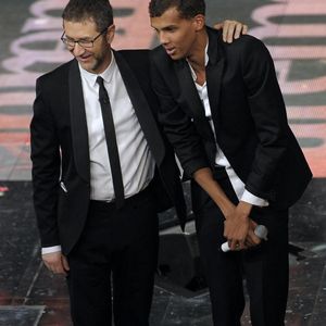 Stromae, et l'animateur de télévision italien Fabio Fazio se produisent lors de la dernière journée du Festival de la chanson italienne de Sanremo au Théâtre Ariston à Sanremo, Italie, le 22 février 2014. Photo Claudio Onorati/ANSA/ABACAPRESS.COM