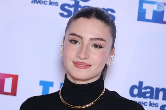 Malgré la compétition, leur complicité artistique a donné naissance à ce morceau.

Lenie participe au photocall de Danse Avec Les Stars dans les studios de TF1 le 16 janvier 2025. Photo par Jerome Domine/ABACAPRESS.COM