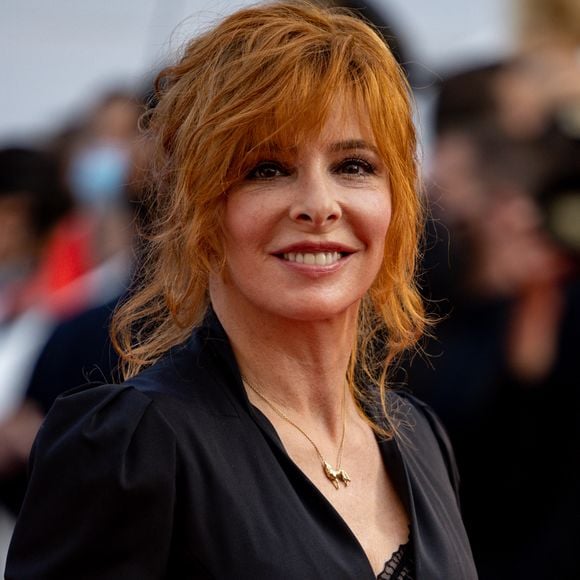 Elle a marqué ses camarades par son charme et sa discrétion. 

Mylène Farmer à la montée des marches du film « OSS 117 : Alerte rouge en Afrique Noire » lors du 74ème Festival International du Film de Cannes. Le 17 juillet 2021. © Borde-Jacovides-Moreau / Bestimage