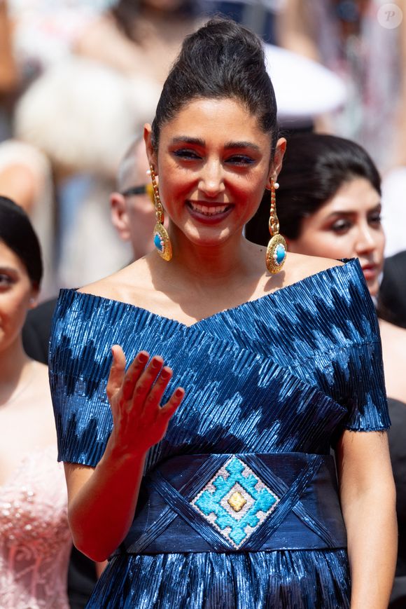 Golshifteh Farahani (Habillée par Araz Fazeli) - Montée des marches du film « The seed of the sacred fig » lors du 77ème Festival International du Film de Cannes, au Palais des Festivals à Cannes. Le 24 mai 2024 © Jacovides-Moreau / Bestimage