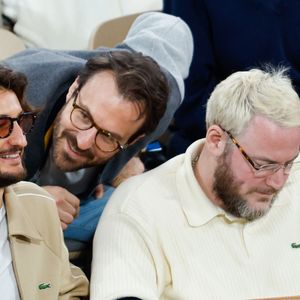 Pierre Niney et Igor Gotesman en tribunes lors des Internationaux de France de Tennis de Roland Garros 2025, à Paris, France, le 6 juin 2025. © Jacovides-Moreau/Bestimage