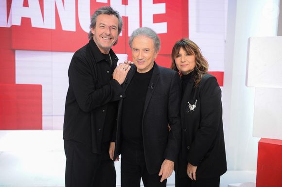 Michel Drucker, Jean-Luc Reichmann et Nathalie Lecoultre à l'enregistrement de l'émission Vivement Dimanche au Pavillon Gabriel à Paris le 9 janvier 2024. Photo Bestimage