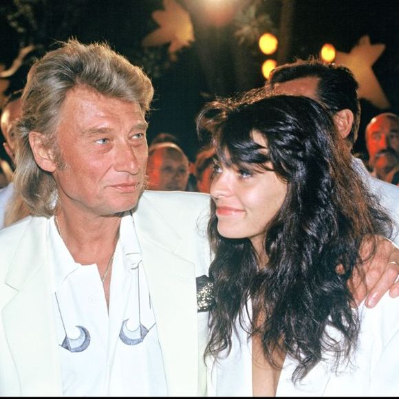 Johnny Hallyday et Adeline Blondieau à Saint-Tropez, le 27 juillet 1991.