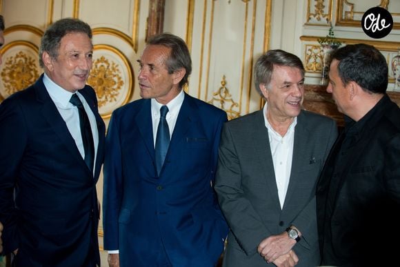 Michel Drucker, Jacky Ickx, Salvatore Adamo, François Pirette - Michel Drucker élevé au rang de commandeur de l'Ordre de la Couronne lors d'une cérémonie qui a eu lieu au palais d'Egmont à Bruxelles le 27 juin 2014 Frederic Andrieu / Bestimage