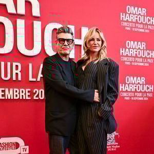 Marc Lavoine et sa compagne Adriana Karembeu au photocall du "concerto pour la paix" de Omar Harfouch au Théâtre des Champs-Elysées à Paris le 18 septembre 2024.

© Perusseau / Tribeca / Bestimage
