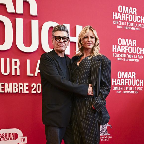 Marc Lavoine et sa compagne Adriana Karembeu au photocall du "concerto pour la paix" de Omar Harfouch au Théâtre des Champs-Elysées à Paris le 18 septembre 2024.

© Perusseau / Tribeca / Bestimage