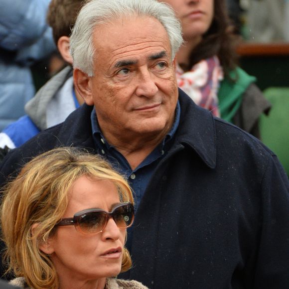 Dominique Strauss-Kahn et sa compagne Myriam L'Aouffir assistent à la finale féminine entre l'Américaine Serena Williams et la Russe Maria Sharapova lors des Internationaux de France de Tennis 2013 au stade Roland-Garros à Paris, France, le 8 juin 2013. Williams a gagné 6-4, 6-4. Photo Jeremy Charriau/ABACAPRESS.COM