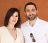 Après avoir officié sur RMC, Europe 1, France Bleu et C8, Jimmy Mohamed présente aujourd'hui quotidiennement Le Magazine de la Santé sur France 5 et donne ses conseils santé sur "RTL". 

Jimmy Mohamed et sa femme Souailla au village lors des Internationaux de France de tennis de Roland Garros, à Paris, France. © Jacovides-Moreau/Bestimage