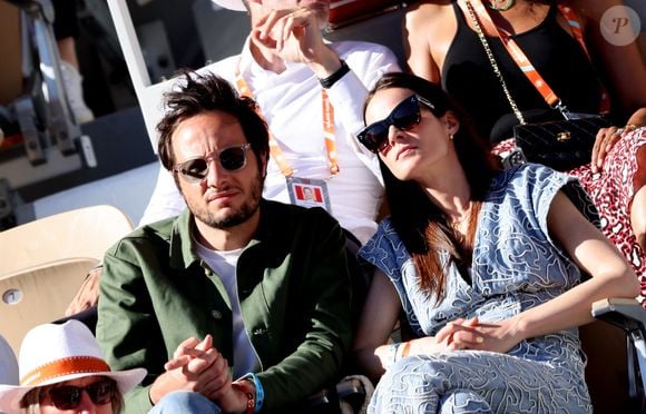 Vianney et sa femme Catherine Robert - Célébrités dans les tribunes des Internationaux de France de tennis de Roland Garros 2024 à Paris le 7 juin 2024.  © Jacovides-Moreau/Bestimage