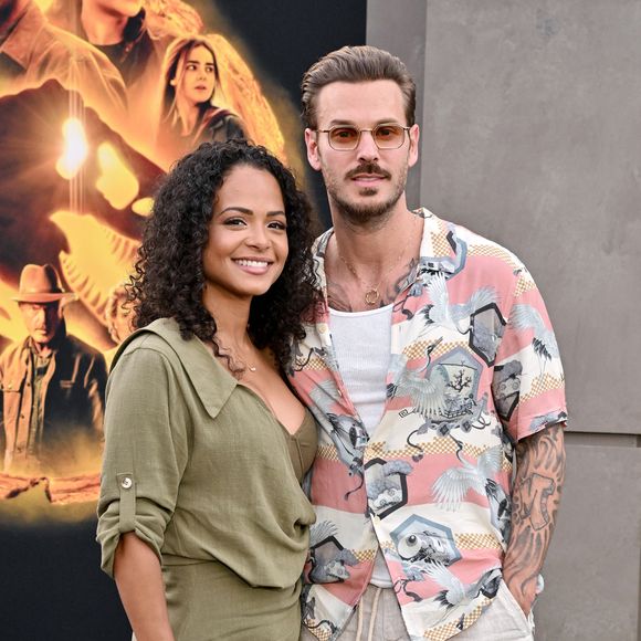 Il y a trois ans, celui qui s'est récemment engagé avec Sony Music a été à l'affiche de la pièce Les "Grandes ambitions" mise en scène par Philippe Lellouche. Raison pour laquelle le grand ami de Tony Parker s'est installé dans la capitale française avec son épouse Christina Milian et leurs deux enfants Isaiah (2020) et Kenna (2021), sans oublier sa belle-fille Violet, née d'une précédente relation. Exit Los Angeles...

Christina Milian et M Pokora (Matt Pokora) à la première du film "Jurassic World Dominion" à Los Angeles, le 6 juin 2022. (AGENCE / BESTIMAGE).