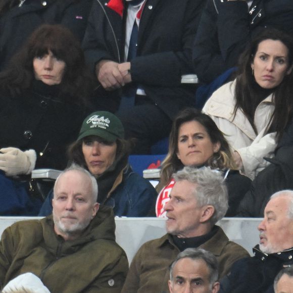Denis Brogniart, Amélie Mauresmo, Luka Karabatic, Nikola Karabatic, Tony Estanguet au match de rugby du Tournoi des Six Nations France contre Angleterre au Stade de France à Saint-Denis le 14 mars 2026. © Lionel Urman / Bestimage