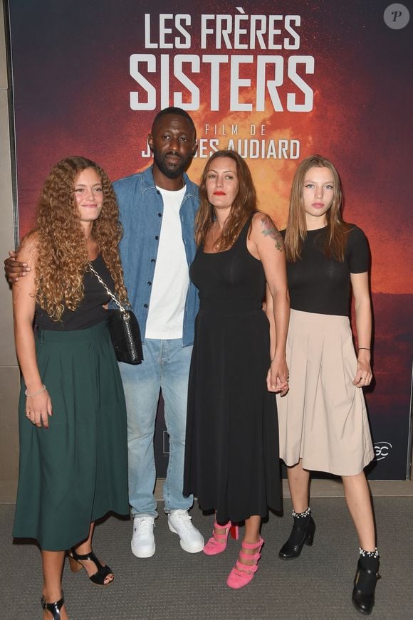 Barbara Rocher (fille de Karole Roche, Karole Rocher et son compagnon Thomas Ngijol, Gina Rocher (fille de Karole Rocher) - Avant-première du film "Les frères sisters" au cinéma l'UGC Normandie à Paris le 11 septembre 2018. © Coadic Guirec/Bestimage