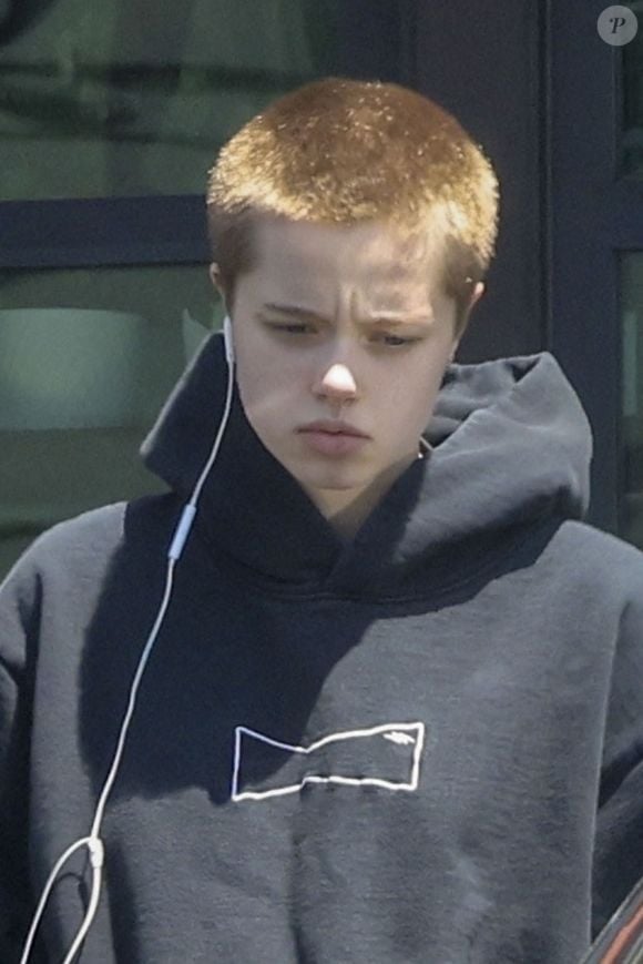 Los Feliz, CA  - EXCLUSIVE  - Shiloh Jolie-Pitt, Angelina Jolie and Brad Pitt's child, was photographed running errands. Shiloh wears black clothing, short hair, headphones, Nike sneakers, and carries a bag.



Pictured: Shiloh Jolie Pitt