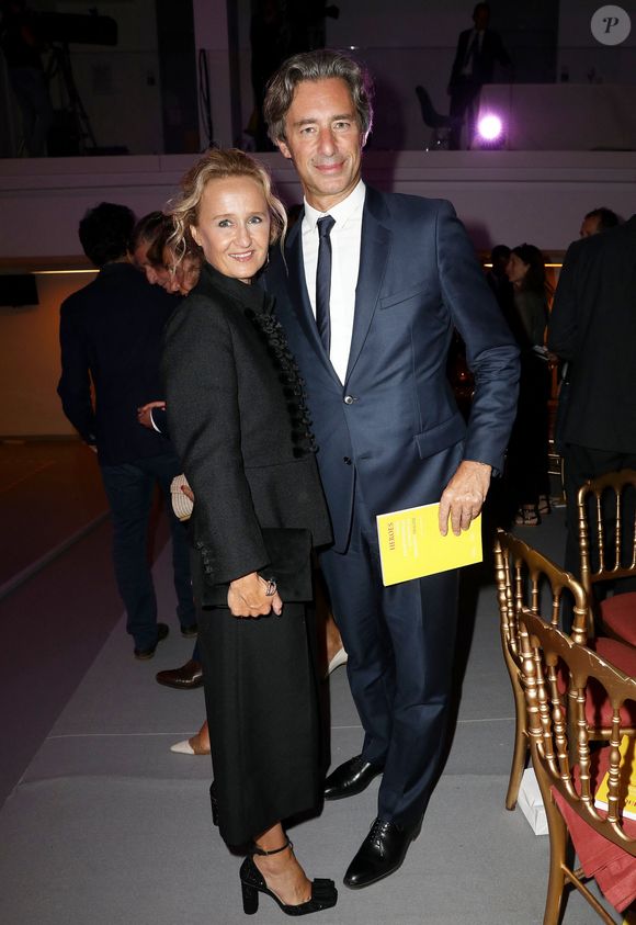 Exclusif - Caroline Roux et son mari Laurent Solly - Le professeur S.Lyonnet, président de l'Institut des maladies génétiques, et le galériste K. Mennour ont organisé la 4ème édition de la soirée "Heroes for Imagine", une grande vente aux enchères d’oeuvres d'art, animée par G.Elmaleh et dirigée par Christie's, à l'institut Imagine, 24 boulevard du Montparnasse dans le 15ème arrondissement de Paris, France, le 12 septembre 2022. © Dominique Jacovides/Bestimage