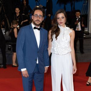 Thomas Hollande et Émilie Broussouloux assistent à la projection de "R.M.N" lors de la 75e édition du festival de Cannes au Palais des Festivals le 21 mai 2022 à Cannes, France. Photo by Shootpix/ABACAPRESS.COM