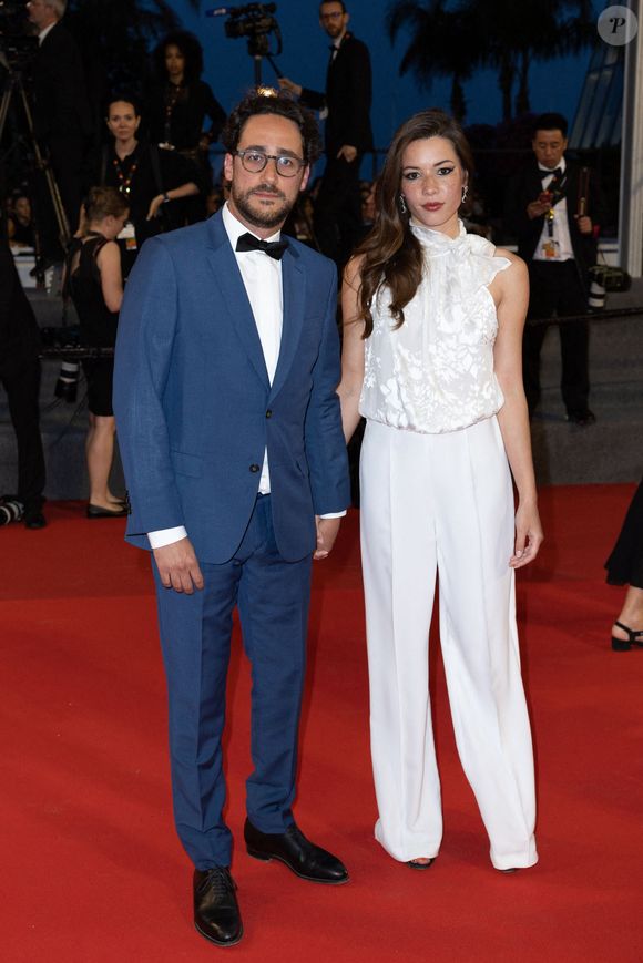 Thomas Hollande et Émilie Broussouloux assistent à la projection de "R.M.N" lors de la 75e édition du festival de Cannes au Palais des Festivals le 21 mai 2022 à Cannes, France. Photo by Shootpix/ABACAPRESS.COM
