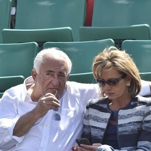 Dominique Strauss Kahn et sa petite amie Myriam L'Aouffir assistant aux Internationaux de France de Tennis à Roland Garros à Paris, le 30 mai 2015.