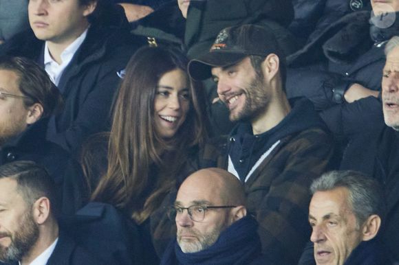 Exclusif - Louis Sarkozy et sa femme Natali Husic, Nicolas Sarkozy   - People en tribunes du match de Ligue 1 Uber Eats "PSG contre Reims" (1-1) au Parc des Princes à Paris le 29 janvier 2023. (AGENCE / BESTIMAGE).