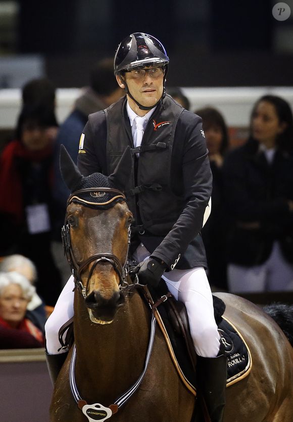 L'animateur de télévision Julien Courbet participe avec son cheval Quercy du Toune à la Coupe du monde Longines FEI de saut d'obstacles qui se tient au Parc des Expositions de Bordeaux, France, le 7 février 2014. Photo Patrick Bernard/Abaca